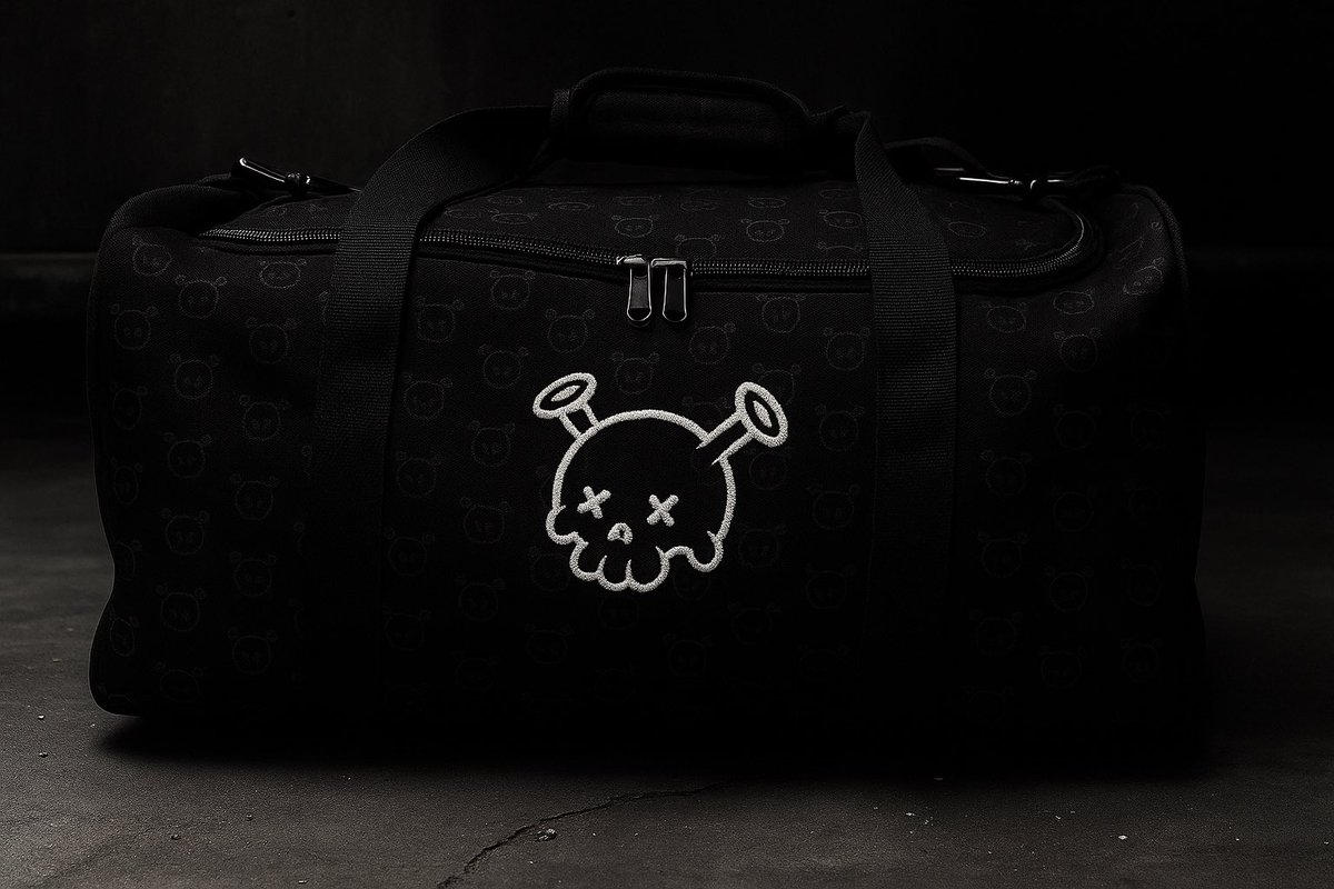 I was sitting in the airline lounge, half-asleep, waiting on a delayed flight. 

Suddenly someone walked by carrying that bag. All black, stitched skull, quiet but loud if you knew. I didn’t say anything… but I knew right then…

This guy had made it.