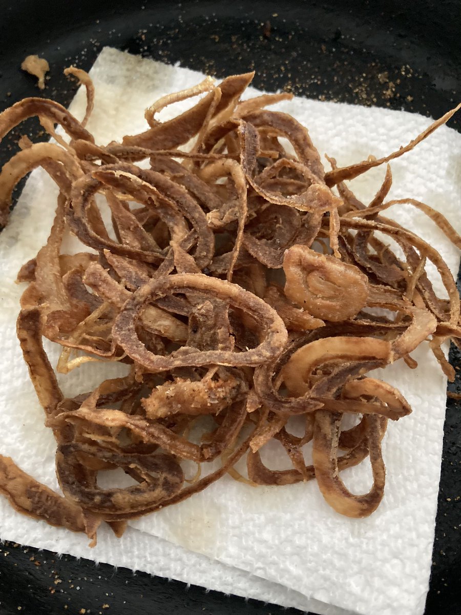 Thin cut onions, in flour and fried. Good on salads and in wraps and burgers.