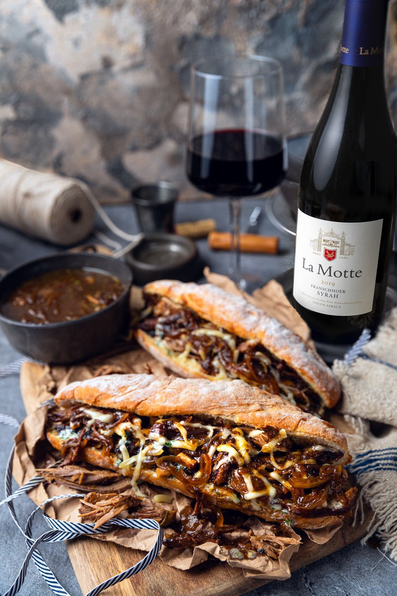 In celebration of the <a href="/Shiraz_SA/">Shiraz_SA</a> #SevenDaysofShiraz in August, try this weekend-friendly recipe for a beef French-dip sandwich - tender slices of roast beef piled high in a crusty baguette, dipped in a rich jus. So satisfying with La Motte Syrah! la-motte.com/blogs/news/bee…
