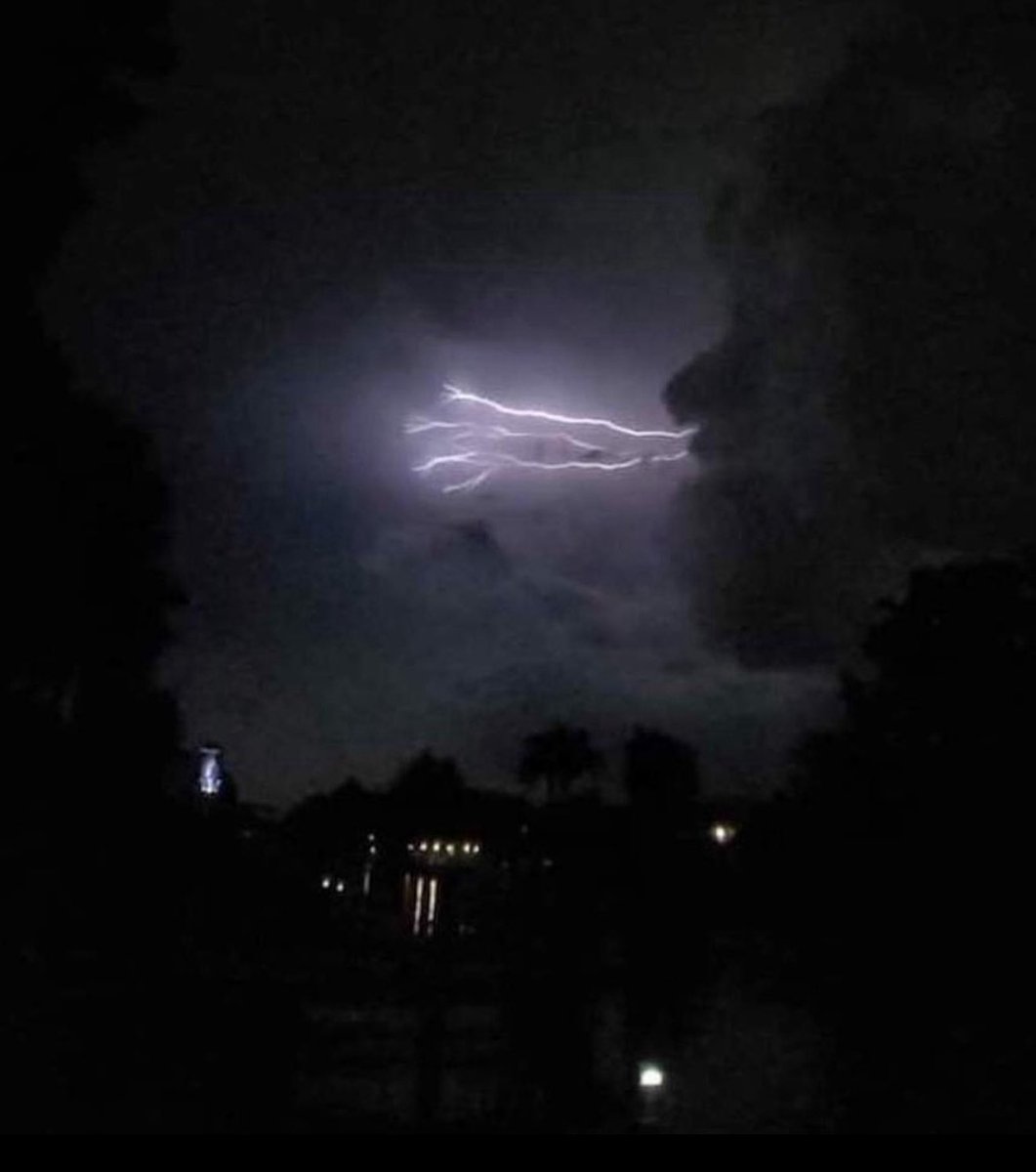 BrandonBradbury's tweet photo. When the storm speaks, even the sky listens. ⚡️A face in the clouds, lightning from its mouth—nature showing us it’s alive. #StormWhispers #SkyFace #NatureIsArt #cloud #lightning #viral https://t.co/CKoPC6QFLi