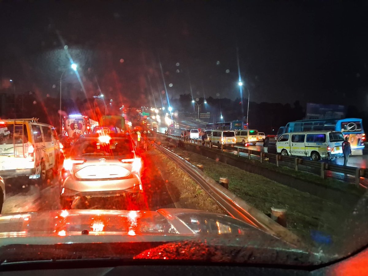 Thika road heading to town in between Allsopes and Garden city, both lanes highway and service, many accidents... heavy traffic and its raining..