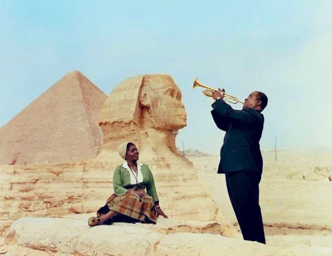 SVG__Collection's tweet image. Louis Armstrong and his wife Lucille at the Great Sphinx and the Pyramids of Giza (1961)
