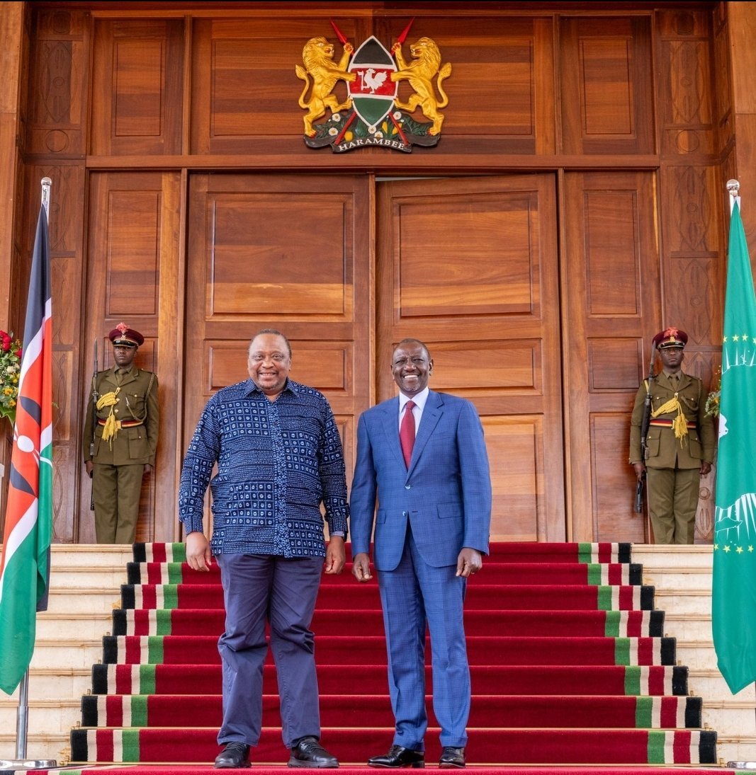 UnchainDjango's tweet image. Tutam posing with wantam at state house