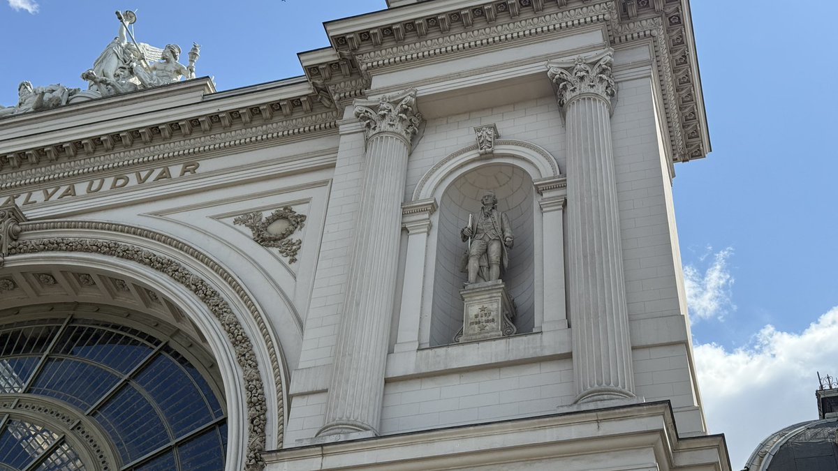 Just been across the road to see the wonder that is Budapest Keleti station, with statues of George Stephenson &amp; James Watt on its beautiful facade. Two Brits clinging to the front of a Hungarian railway station!