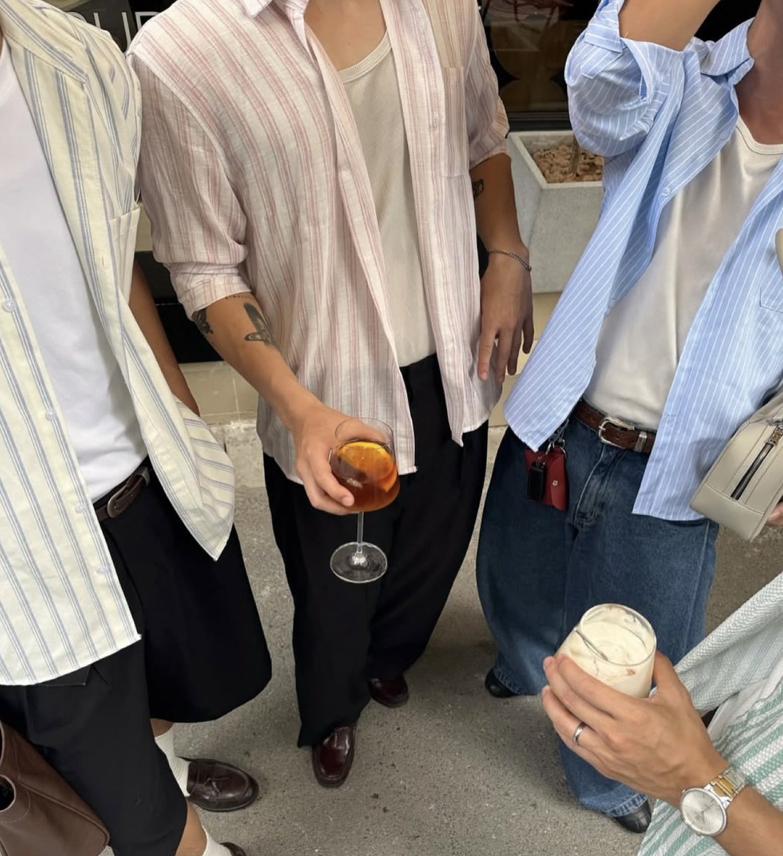 ThrowingFits's tweet image. They’re putting microchips in the matcha in Manhattan that makes anyone under the age of 28 dress like this