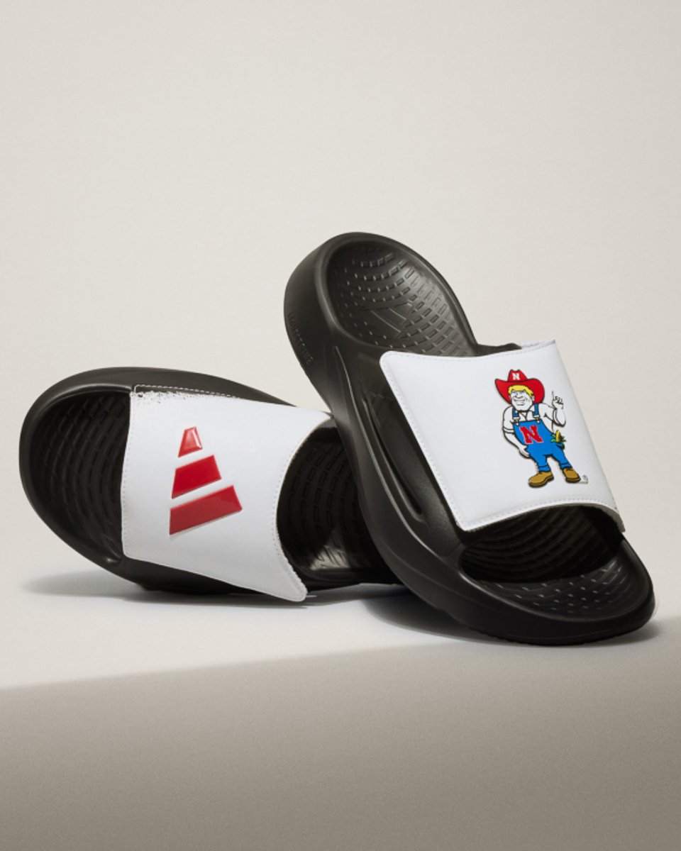 JUST DROPPED: Nebraska Adidas Lightblaze Slides 🔥 Limited quantities available. Get yours online or in-store at our Downtown Lincoln location today! 
alumnihall.com/adidas/nebrask…