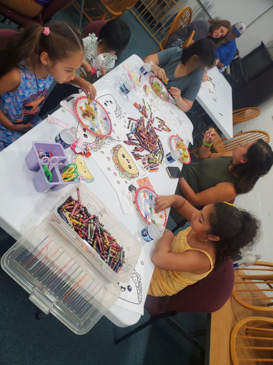 On Wed., July 30th, the children's dept. held its last weekly summer Taste the Book series program.  Attendees listened to the story Little Taco Truck by Tanya Valentine, did a related craft, and then were treated to some (you guessed it) tacos!