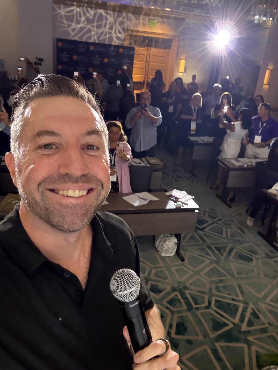I took this selfie at the beginning of my AI keynote.

Right before diving in, I asked everyone in the room to take one too.

Why?

To capture the moment their life changed.

Not someday. Right then.

A simple anchor to remind them: “This was the start.”

And I took mine too,