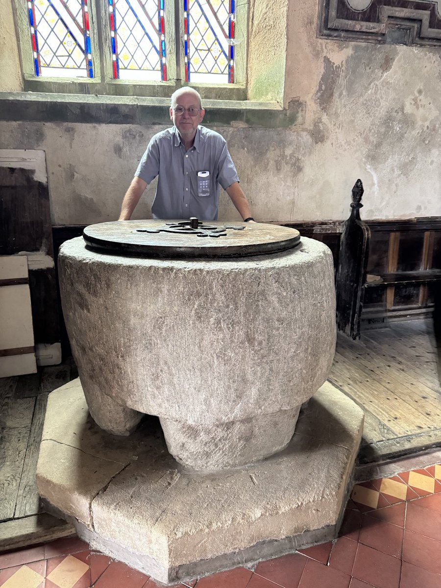 #fontsonfriday. Massive tub, possibly C8th century. St Stephen’s church, Old Radnor, Powys. Husband in for scale, mother in law hiding