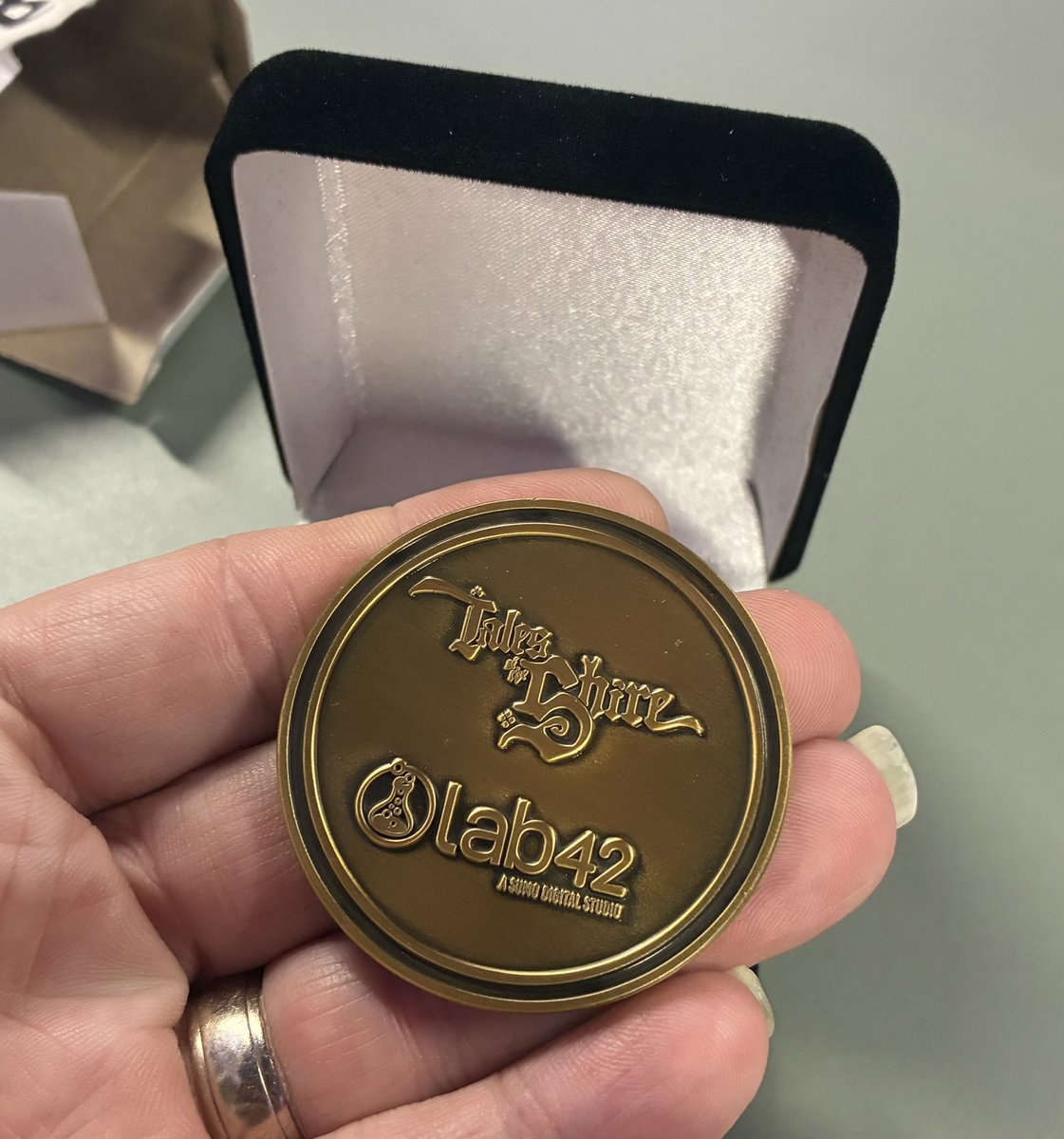 To celebrate <a href="/talesoftheshire/">Tales of the Shire</a> releasing, @lab42games had a bit of a bash - and some of our team put together a lovely keepsake for everyone that worked on it with @wetaworkshop. We had to find our Elvish name! I love mine so much!