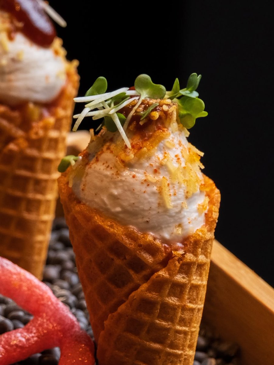From the streets of Banaras to the heart of London.. A chaat that looks nothing like chaat—until the flavours hit.
-
Meet our Banarasi Amrood Ki Chaat: crispy guava cones filled with spiced cream, layered with tangy tamarind and raspberry sauces, and topped with a crunch that