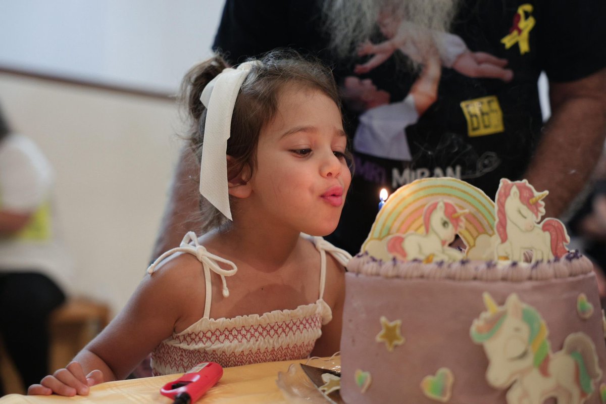 LishayLM's tweet photo. Today we celebrated Roni’s birthday at hostage Square. Instead of daddy, plenty of strangers showed up to shower her with love. 

Every day she gets smarter and wiser, and every day it becomes harder to shield her from the horror of our reality, of her personal reality. 

The kids sang songs and ate cake, while grownups were whispering in terror about the hostage videos Hamas released of Rom and Eviatar. We can’t shield our children from this evil much longer. 

Bring them all home, now.