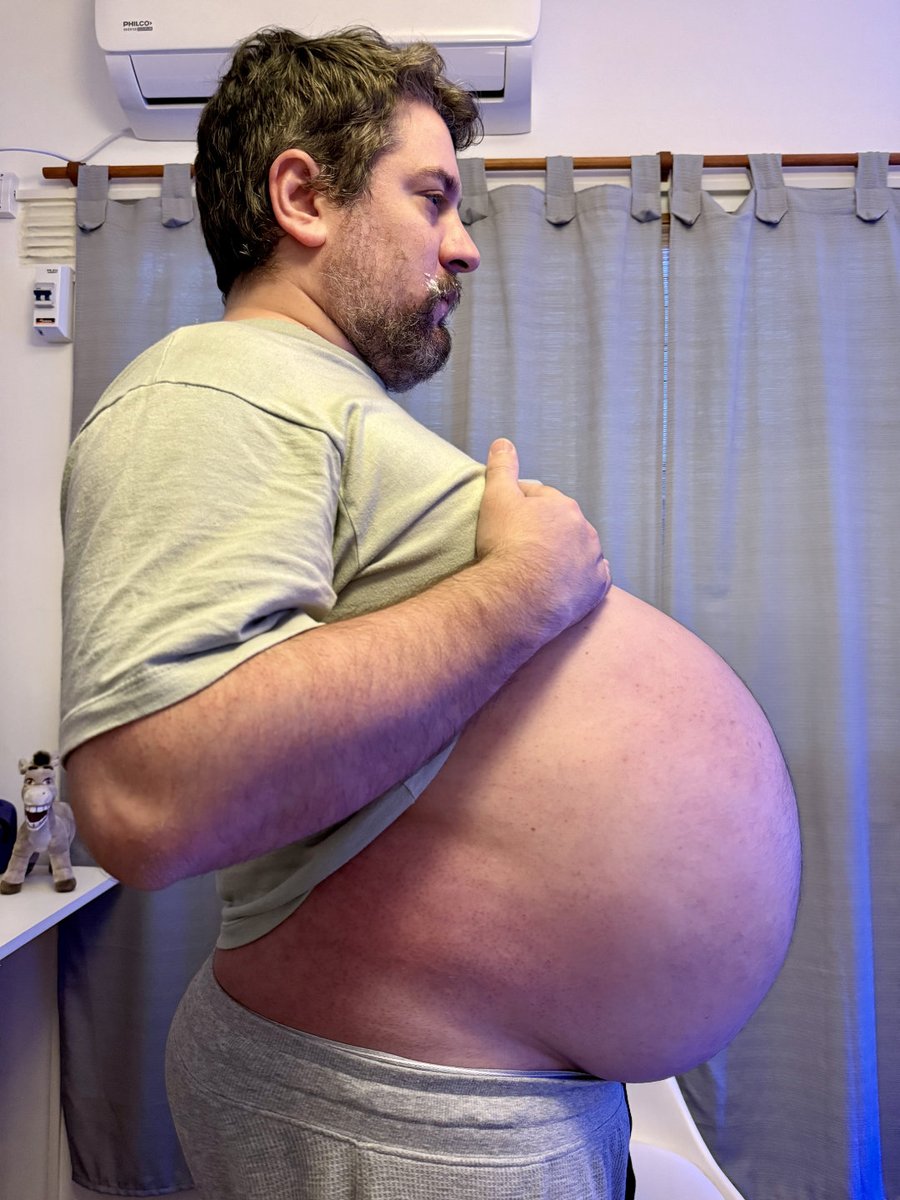 I’m feeling very huge; I have to lean back just to walk! Watch a lot more on my OnlyFans: onlyfans.com/barrigonpanzu #barrigOn #gainer #feedee #pregnantman #muscles #bigbelly #grommr #gaybeef #gaybear #dadbod #gordo #scruff #plumppr