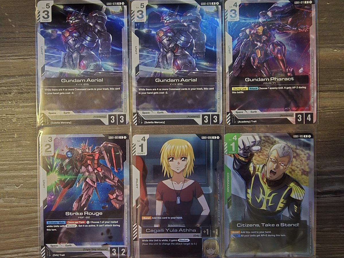 Found some booster packs + Zeon's Rush &amp; Wings of Advance decks out in the wild the other day.

Some pulls! Neato.

#Gundam