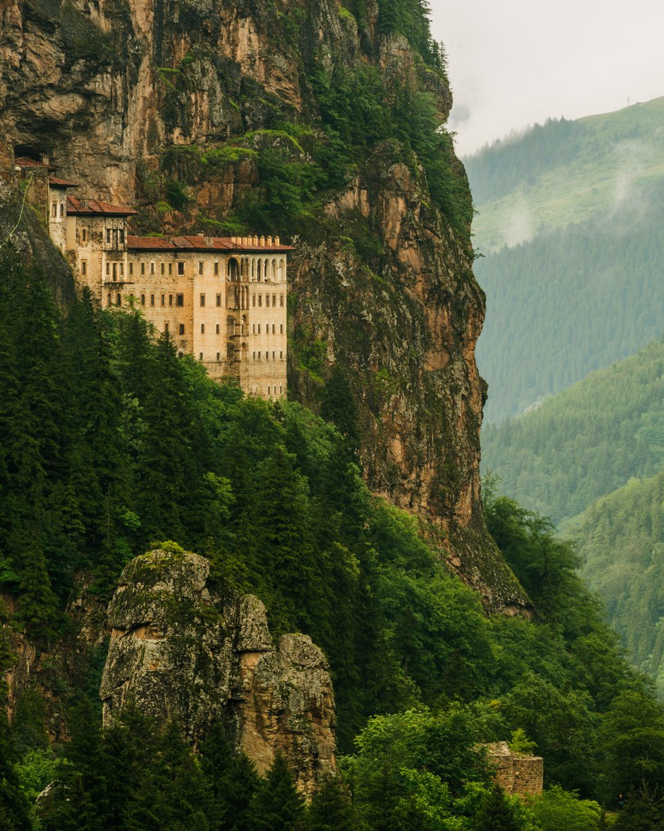 World_Harmony_'s tweet photo. Sumela Monastery clings to a cliff in Turkey’s Black Sea region. Built in the 4th century, it holds stunning frescoes and centuries of Christian history. One of Trabzon’s top historic and touristic landmarks. #Turkey  #History https://t.co/dF6zL6dFp0
