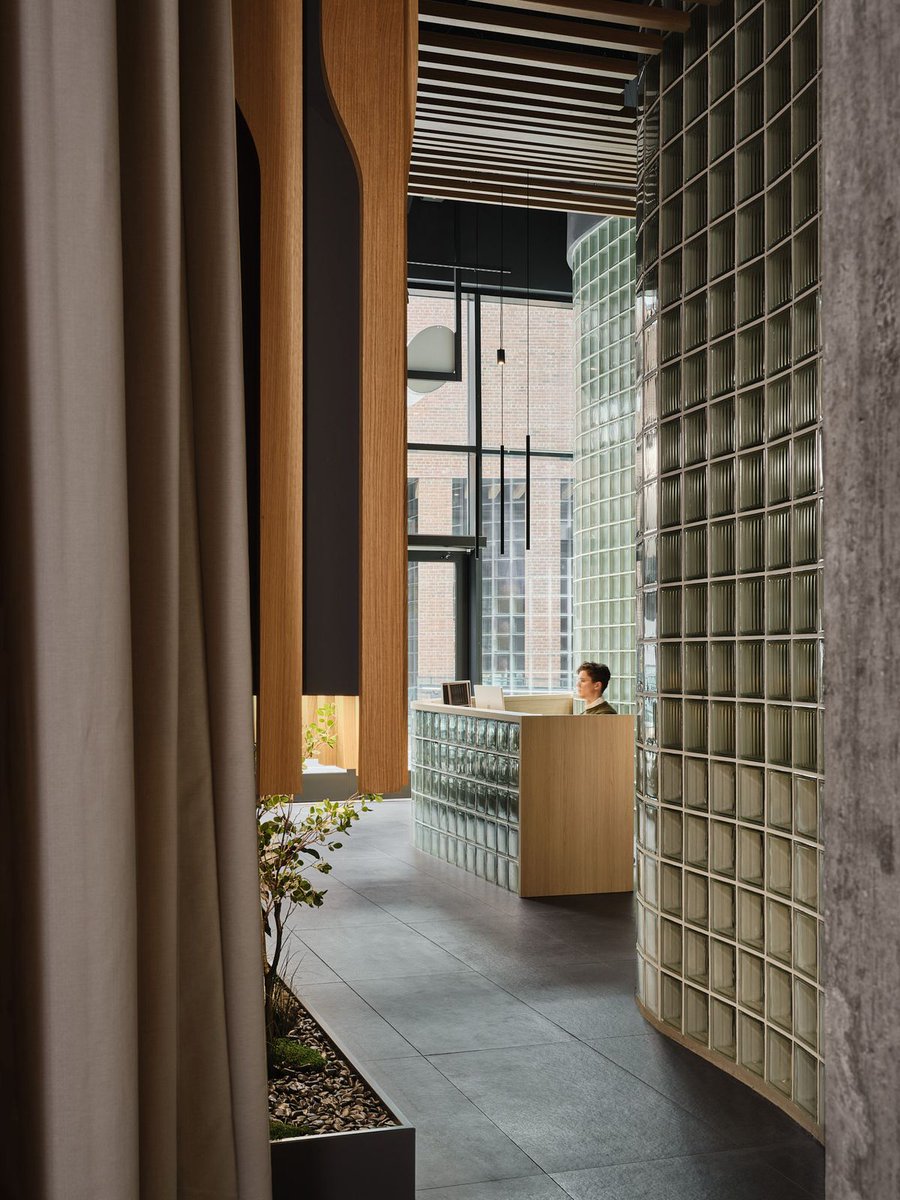 Architizer's tweet photo. This eye care clinic reconfigures the typical layout, placing its laser procedure room at the forefront and screening it with a sculptural glass block wall.

📍Toronto, Canada #ArchitizerAwards
  
Project by: Reflect Architecture
Details: https://t.co/5aOlzKV55d https://t.co/b5HXjthWCE