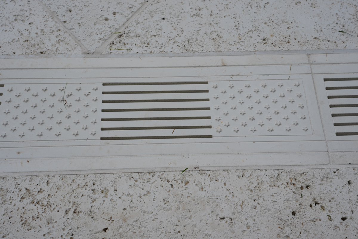 PenguinSix's tweet photo. The drains of the new Rose Garden patio are designed like American flags, with a Presidential Seal in each of the corners. https://t.co/q04YniyH1c