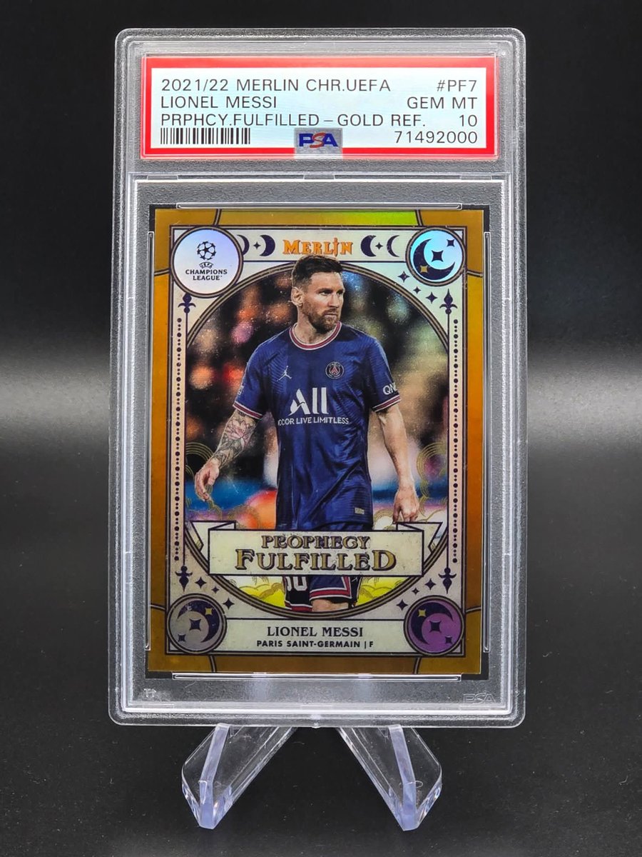 refscollectible's tweet photo. 2021-22 Topps Merlin UEFA #PF7 Lionel Messi “Prophecy Fulfilled” Gold /50. A rare PSA 10 parallel celebrating the prophecy realized: Messi among the very best of the best.

#Messi #ProphecyFulfilled #GoldRefractor #PSA10 #ToppsMerlin #ChampionsLeague #Soccer #GOAT #BallonDor https://t.co/owBKYJKPvi