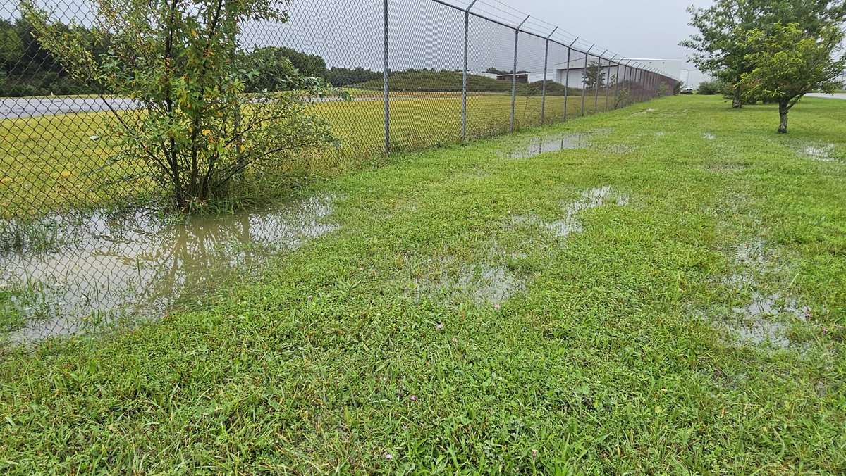 Rain was plentiful in Blacksburg today. Measured 1.51 in the rain gauge at the NWS office.  Field near the VT airport looks a wee bit saturated. #soggy