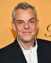 Not a lead actor, but how does he get work?

Nepotism?