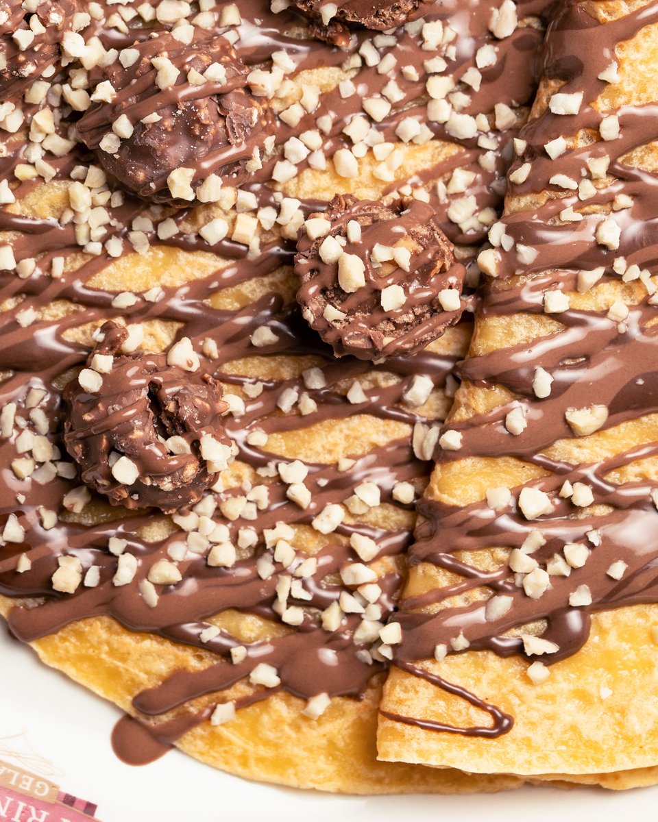 Flippin' heck, our Choco Roche crepe is next-level! 🤩 Packed with Ferrero Rocher, chocolate hazelnut sauce, and chopped nuts, it's pure dessert goals. Seriously, this one slaps. #SprinklesGelato #ChocoRoche #DessertVibes