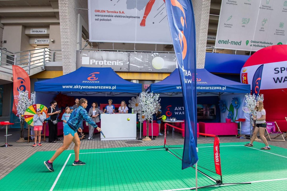 Zapraszam do królestwa tenisa! 🎾
Jeszcze dziś dostępna jest bezpłatna strefa kibica z okazji turnieju WTA125 T-mobile Polish Open. 🎾 Czekają tam na Was gry, zabawy, łamigłówki, quizy i wiele  więcej. 

A już o 12:00 wielki finał singla pomiędzy Viktorija Golubic (SUI) vs