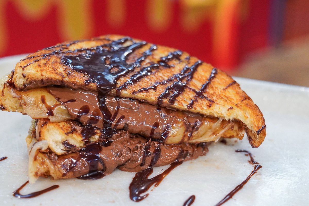 30 Seconds to Mascarpone 🎶 our ooey-gooey dessert grilled cheese stuffed with Nutella, mascarpone, and white cheddar, served with chocolate sauce for dipping. Sweet, salty, melty, perfect.