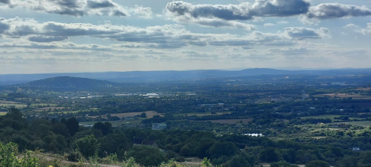Crickley Hill.  Malverns nearby.  Brecon Beacons, Black Mountains, Shropshire Hills all visible - views of 60 miles or more.  Just stunning.