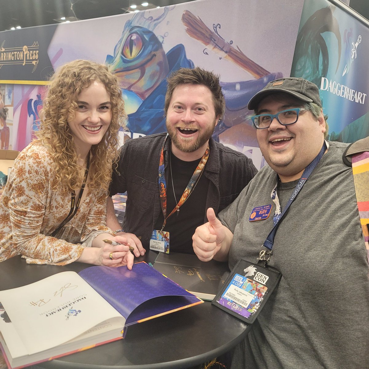 Very excited to have had <a href="/SpenserStarke/">Spenser Starke</a> and <a href="/TheRowanHall/">Rowan Hall</a> sign both my limited edtions of #Daggerheart and #CandelaObscura at the <a href="/DarringtonPress/">Darrington Press</a> booth. Darrington has truly made this a great GenCon!! THANK YOU!