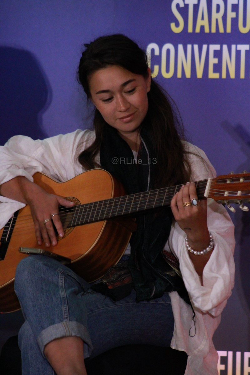 RLine_13's tweet image. KTY showing off her musical skills for a sweet moment at today’s panel at #WitchbombX