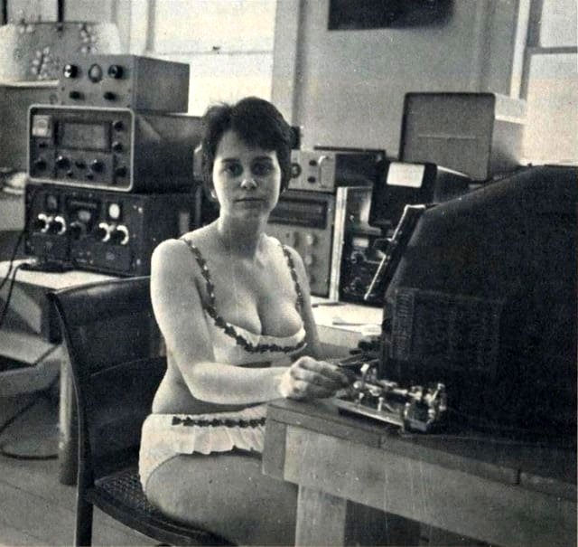 A ham radio operator using a Teletype Model 15 alongside a Morse key
1963