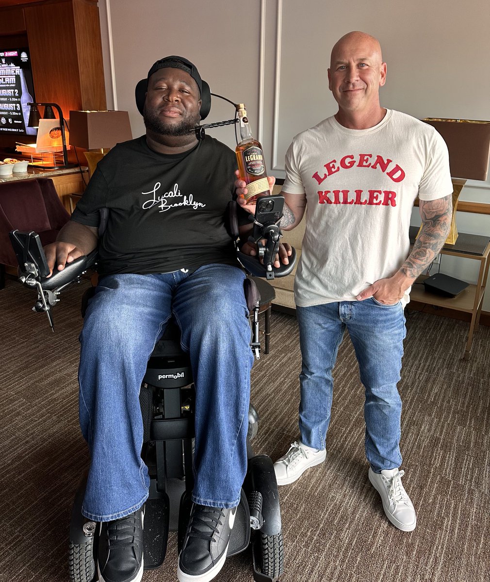 The boys at MetLife Stadium enjoying some wrestling and some bourbon. #SummerSlam