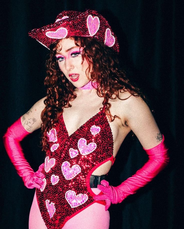 dailyroan's tweet photo. chappell roan has donated two of her iconic looks worn during olivia rodrigo’s guts tour to springfield black tie for an auction benefiting LQBTQ+ charities across missouri! https://t.co/sKGdGYCQEY