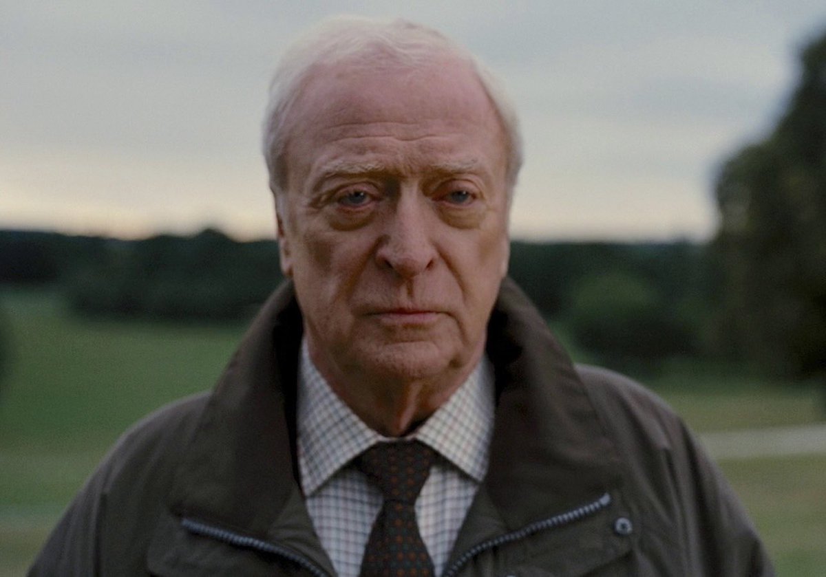 NolanAnalyst's tweet photo. Michael Caine praising Christopher Nolan's humility:

“He's very secretive. He’s made all these millions and millions of dollars, but none of that has rubbed off on him. He lives exactly the same way. No Rolls-Royce, no gold watch, no diamond cuff links, none of that; he still has the same watch he always had, still wears the same clothes. You wouldn’t know he’s the director. Very quiet, very confident, very calm. No bombast at all. Just standing there in his long coat whatever the weather, with a flask of tea in the pocket. I asked him once, ‘Is that vodka in there?’ ‘No, it’s tea.’ He’ll drink it all day. It’s how he solves problems.”