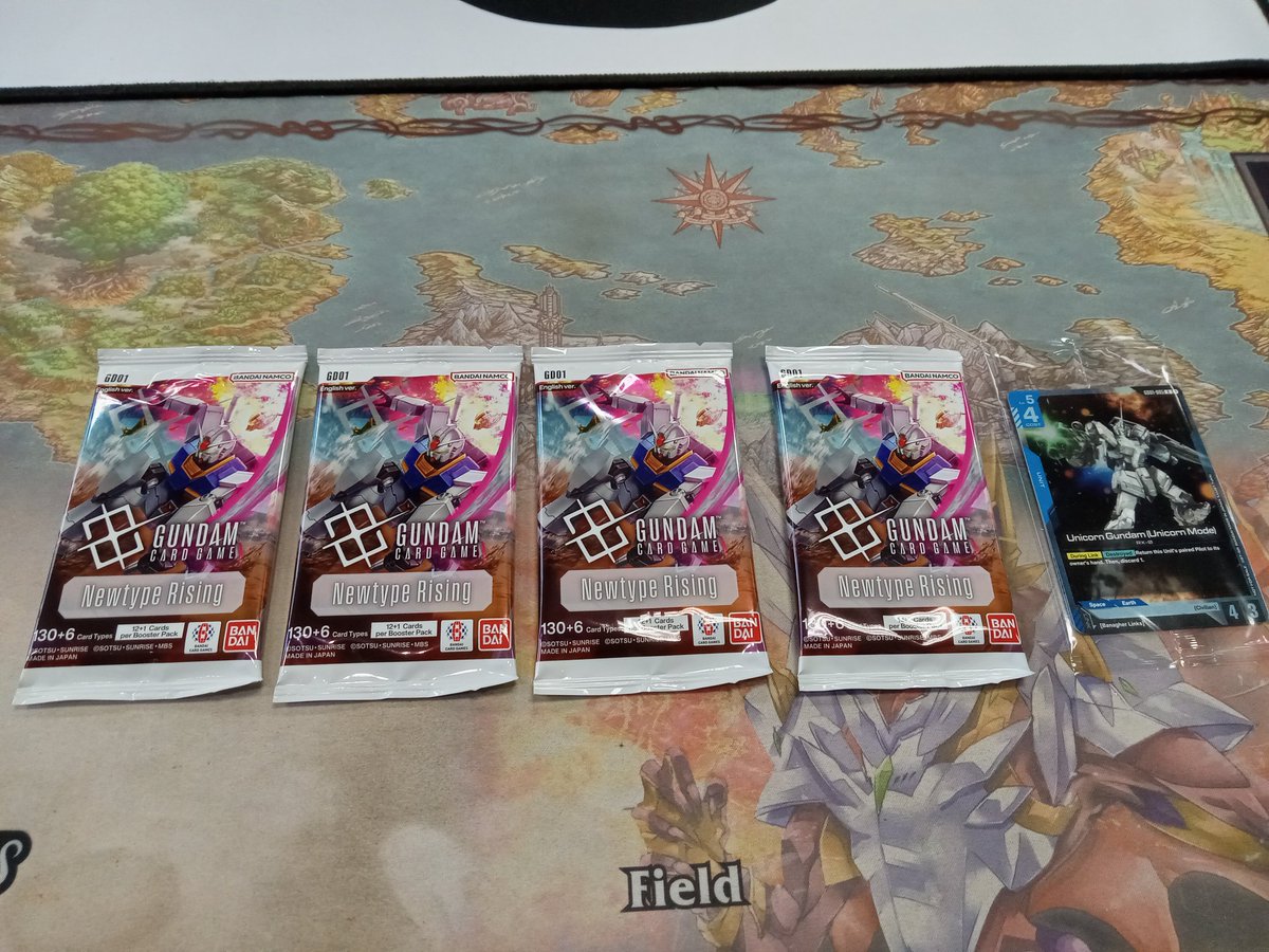 I just finished my first Gundam Card Game Event. 1 win - 2 losses.

Not bad for a random deck build.