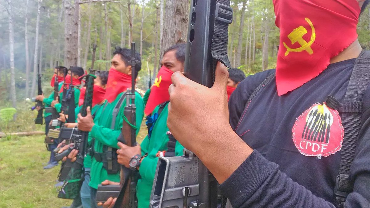 ultras_antifaa's tweet photo. Two communist comrades getting married in a guerrilla camp in the Philippines. https://t.co/NCH5uO0ZG4
