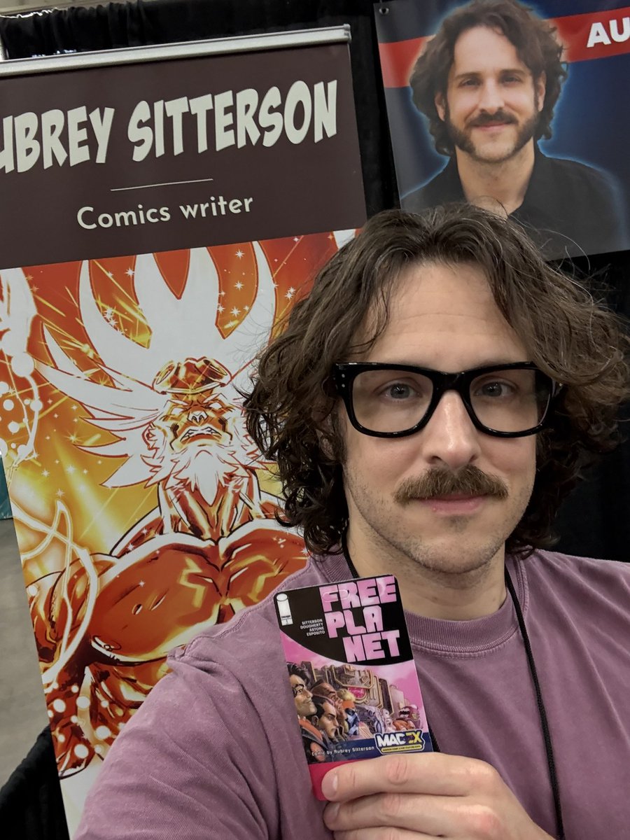 An exciting first for me: My work on a con badge! Come see me for the final day of the Madison Comic and Pop Culture Expo! Hurry though; I should have brought more copies of FREE PLANET!