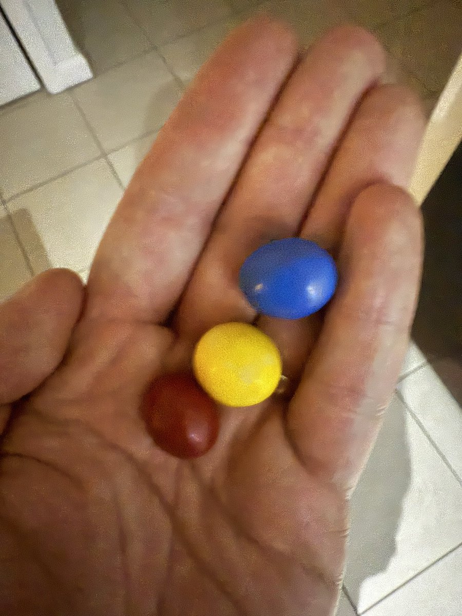 Mikey_Nicholson's tweet photo. I just poured out three random m&ms to celebrate and this is what I got. I fell to my knees in Coles… we’re winning the whole damn thing. #weflyasone #afleaglescrows https://t.co/4JlSTrGxYy
