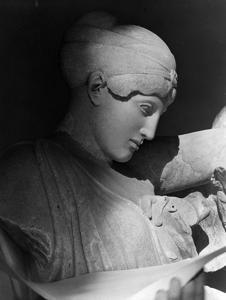 Head of a female Lapith from the Battle of Centaurs scene on the temple of Zeus at Olympia. Photo taken in 1930. Benaki Museum of Greek Civilization.