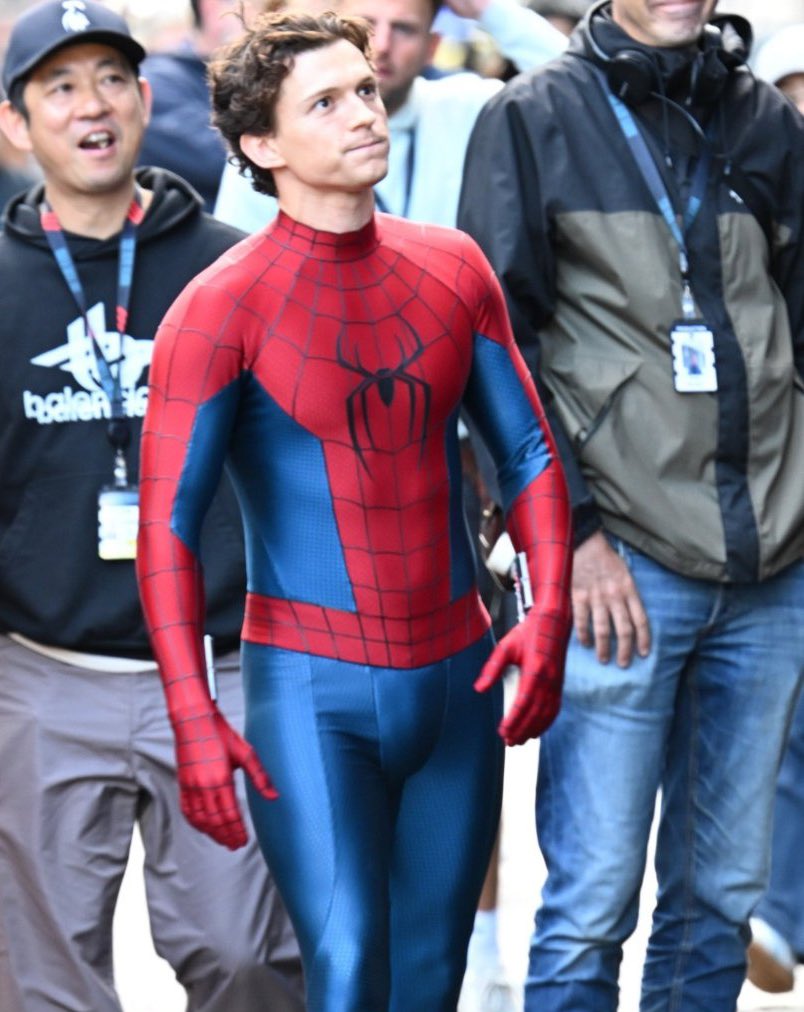 tom holland in the spider-man suit
