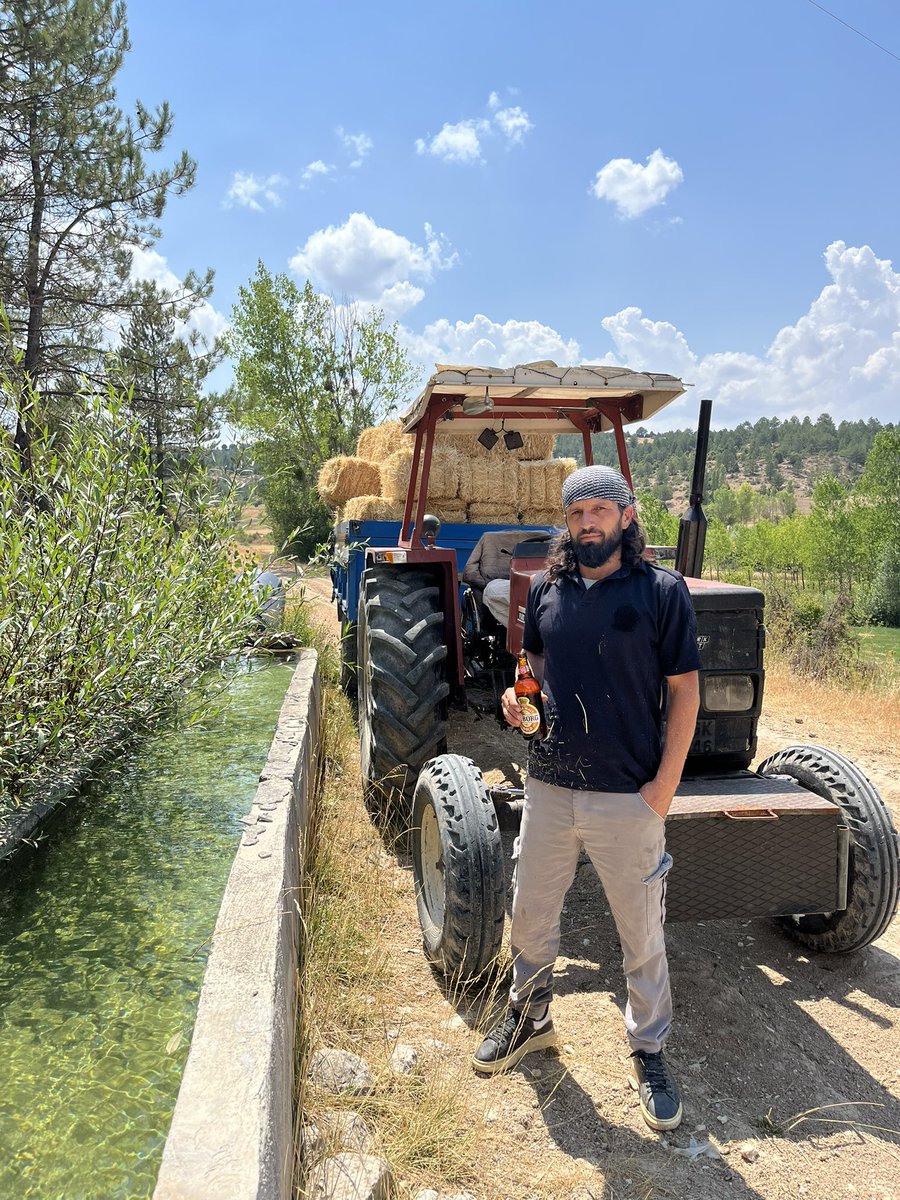 Working the land at his own pace, a farmer’s freedom shines.