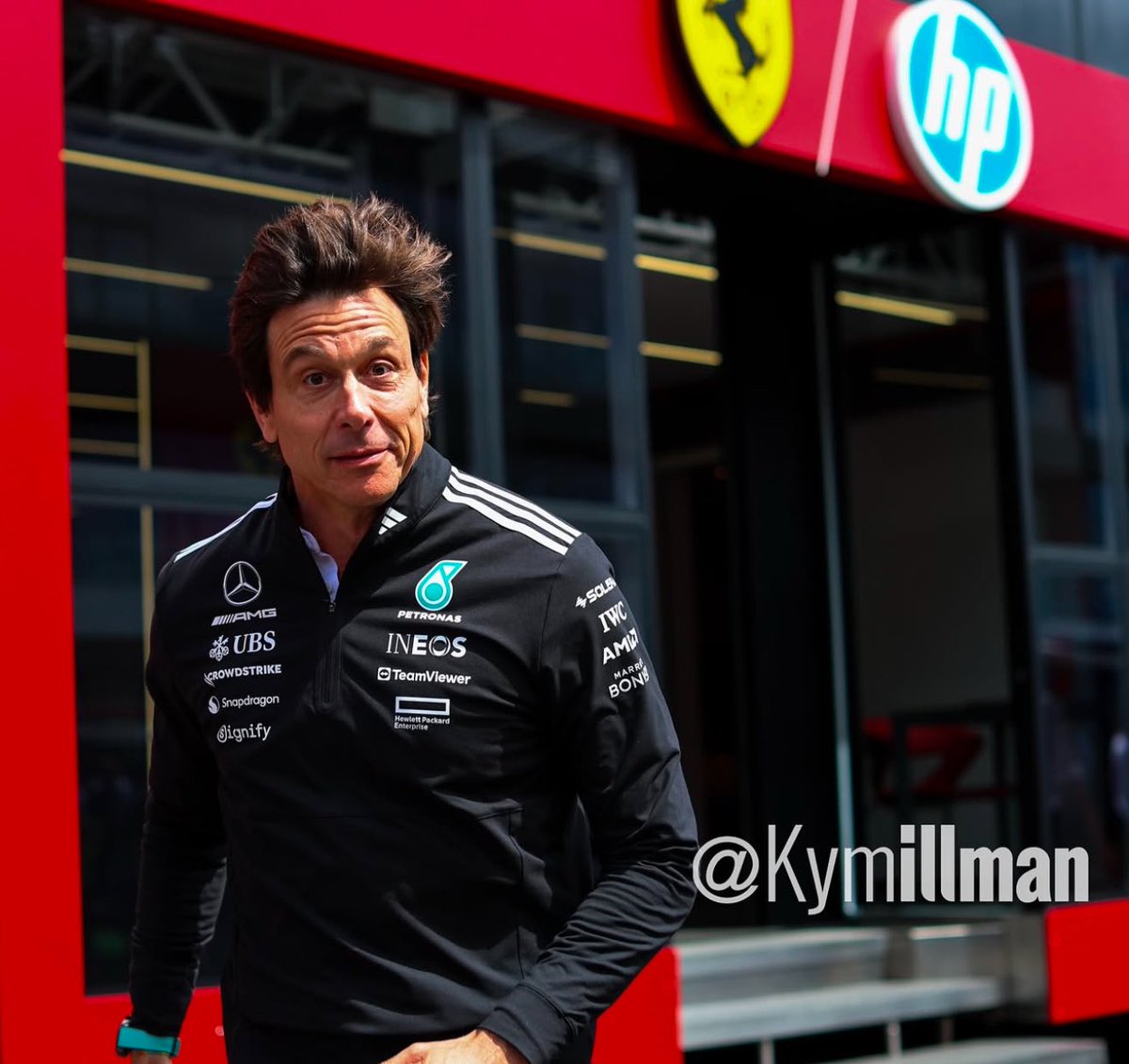 Toto Wolff was seen rushing out of the Ferrari motorhome today !
