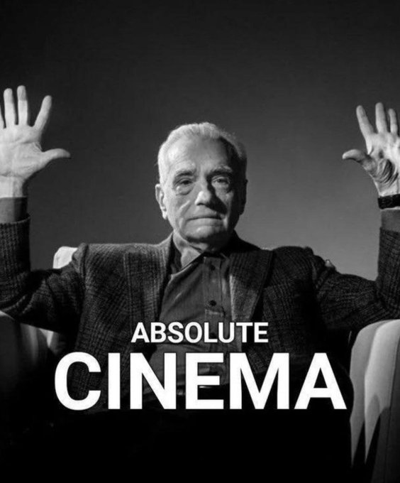 An older man with raised hands and 'ABSOLUTE CINEMA' text