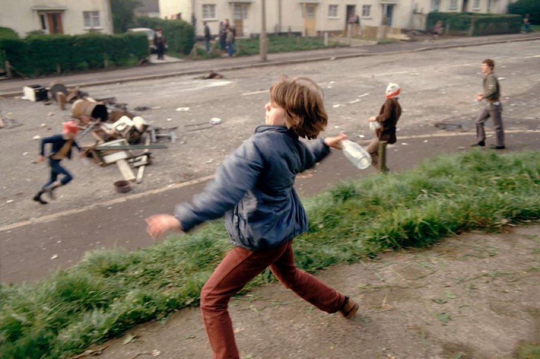 An Irish child seen during a clash with British occupation soldiers. Belfast, 1981.