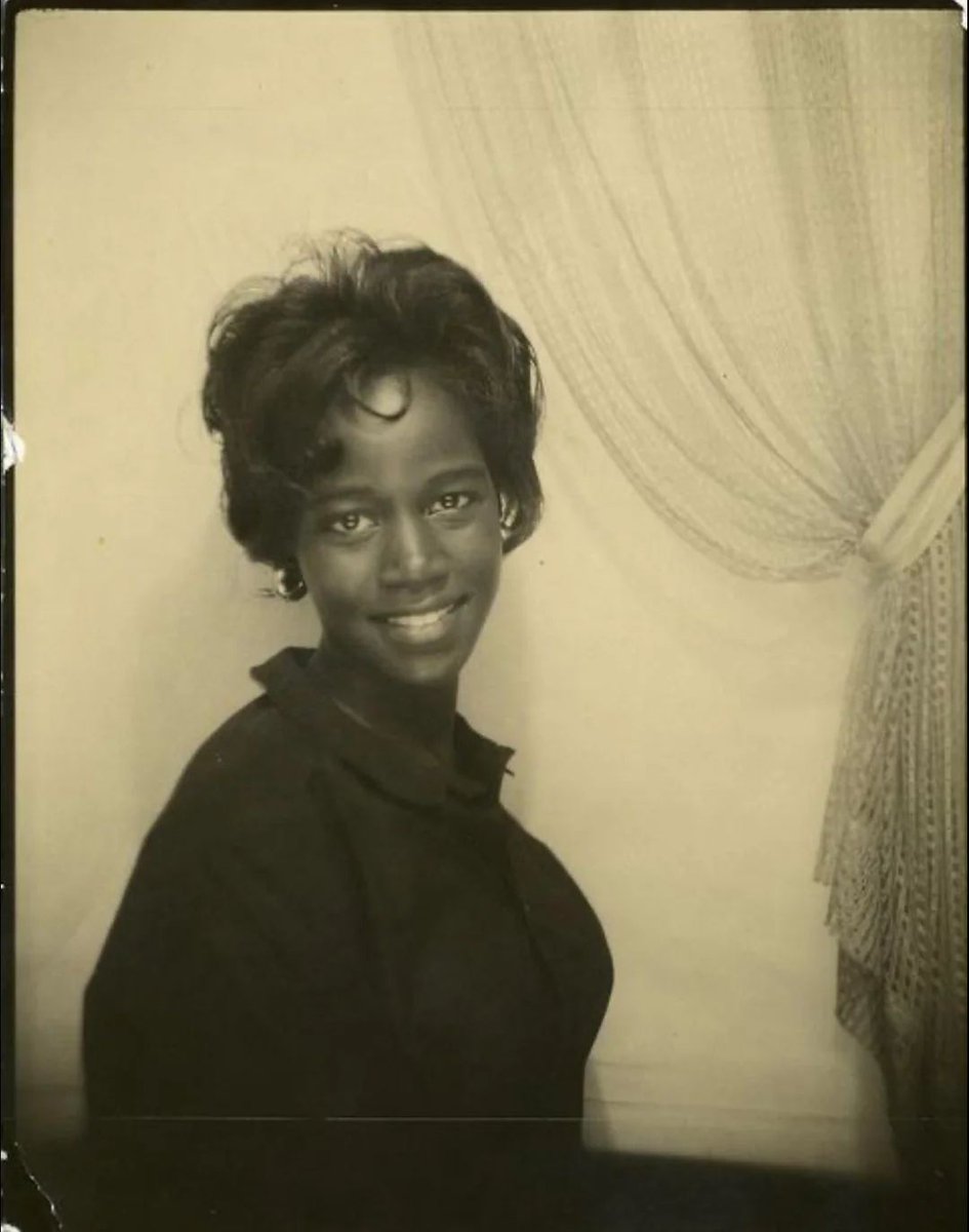 An unidentified girl in a photo booth. (1960)