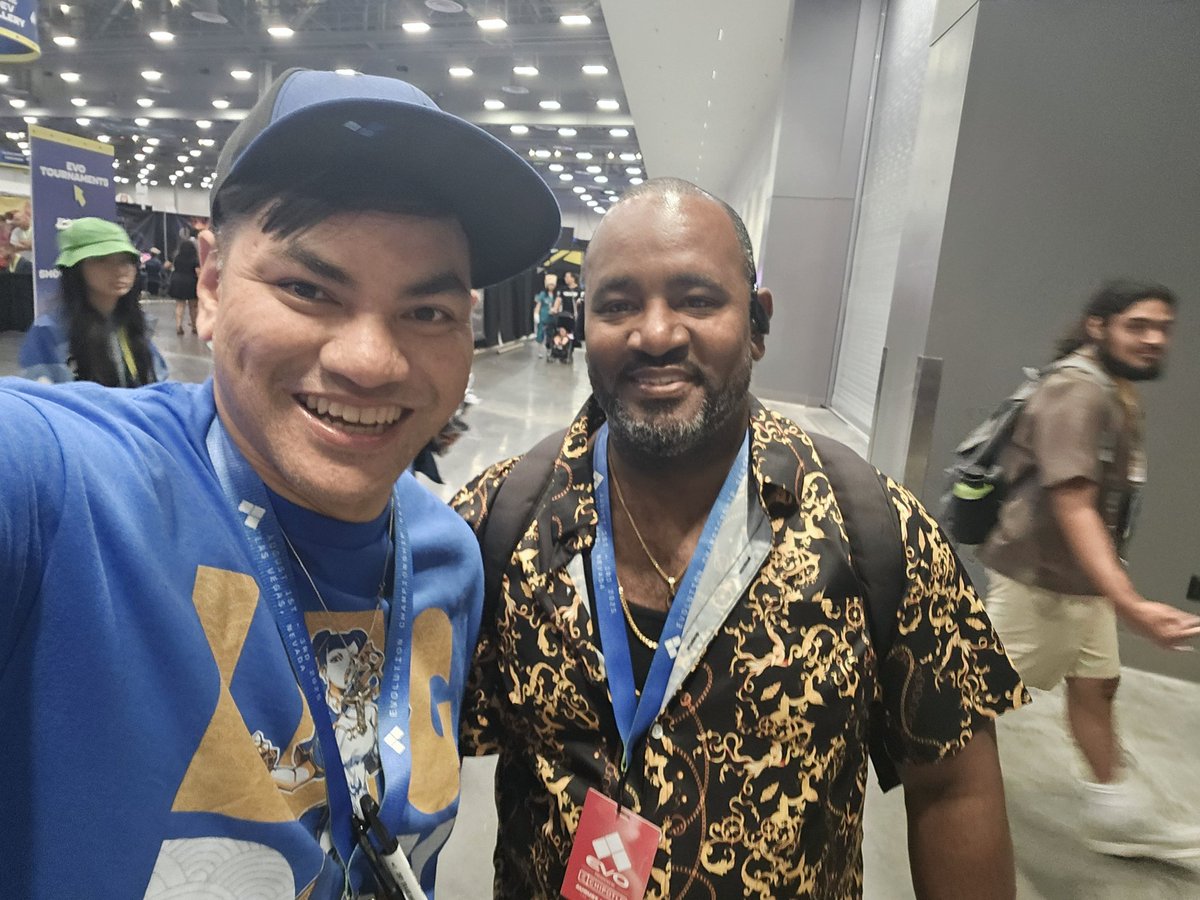 Shoutout to <a href="/Chrismatrix303/">The people's commentator! | TGA</a>, never met you in person, so finally seeing you at EVO was cool. And thanks for being so chill when I approached you! The Matrix + <a href="/IFCYipeS/">YipeS @ Remixd Prints</a> commentary team is one of my favorite for MvC2/3! #EVO2025