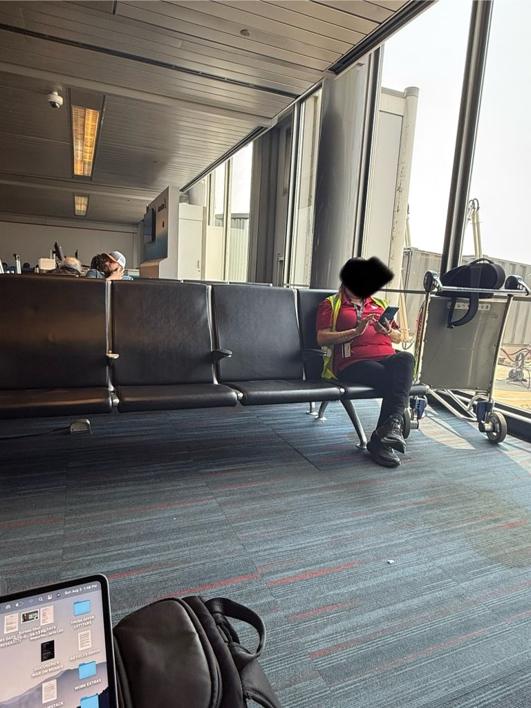 Sitting at the very busy airport editing and this airport worker has her cart blocking a walkway, a family tried to get through (the other side is completely full of people and their suitcases so the father asks this woman (who doesn’t speak good English) to move the cart so the