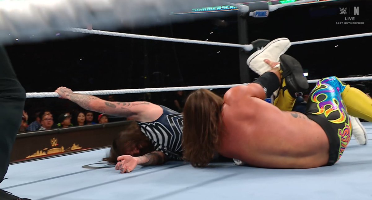 Styles with the Calf Crusher but Dom makes it to the ropes.
#SummerSlam