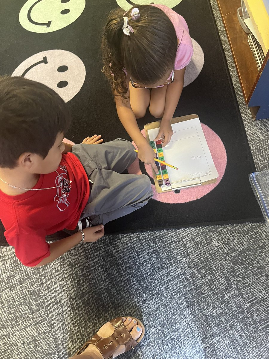 mlchenot's tweet image. What a great first week of school! Officer Rob coming to read to us, STEM project, counting objects and the start of vertical boards!