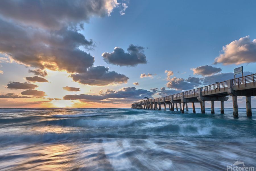 Photograph from Lake Worth Pier in Florida at sunrise.  #homedecor #homedecorating #interiordecor #travel #photography #art4sale #walldecor #artprints #artforsale Please refer to link for info and pricing buff.ly/4hCoFqD